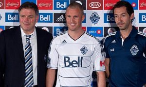Kenny Miller wears his new Vancouver Whitecaps shirt